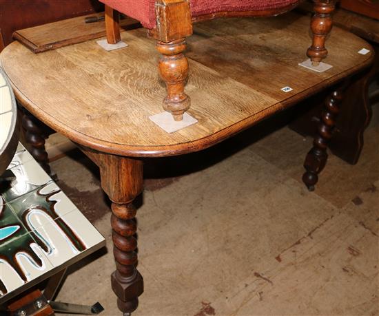 Small oak extending dining table
